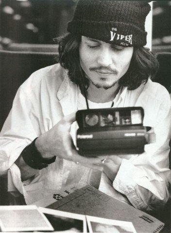 johnny-depp-with-a-polaroid
