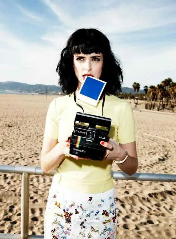 krysten-ritter-with-polaroid-onestep-600